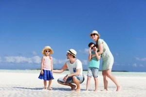 Traveling with the family can get expensive, but following these tips will help you save big. (Photo: Thinkstock)